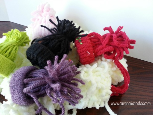 Yarn Snowmen With Hats - What to do with pom poms and hats | Sarah Celebrates