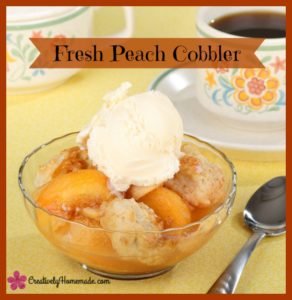 Bowl of peach cobbler with a scoop of ice cream and a cup of coffee